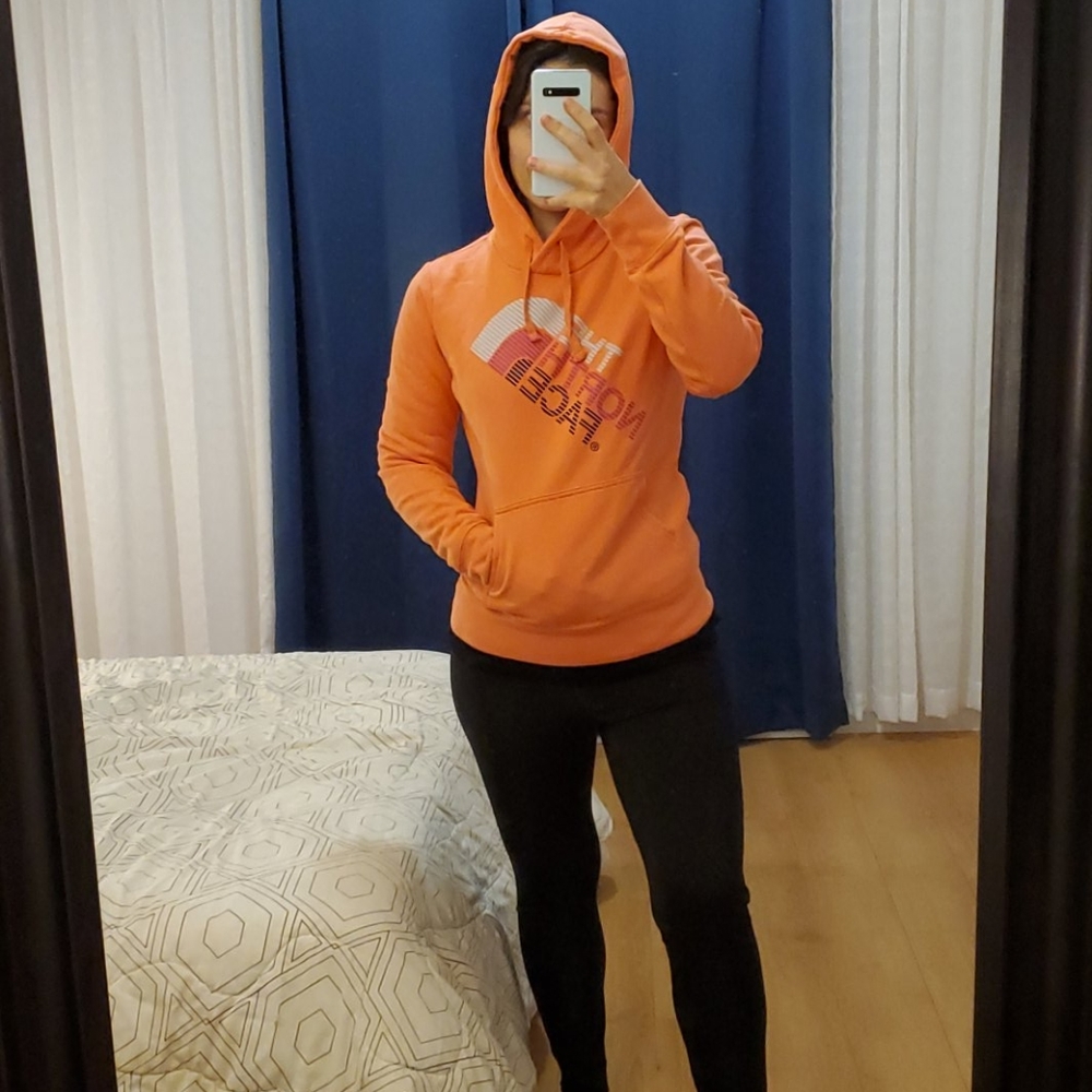 The North Face Coral Pink Hoodie | Vibrant Athleisure Pullover